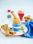 Egg And Soldiers (a soft egg with toast strips, England)