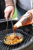 Grilled onions drizzled with barbecue sauce