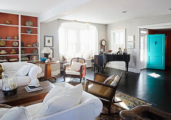 American-style living room with open doorway leading to front door