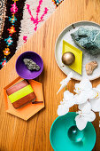 View of coffee table with various decorative objects and orchid