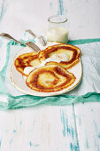 Cinnamon pancakes with a creamy sauce