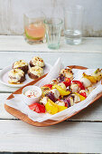 Rainbow chicken skewers with a dip