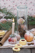 Sugared apples with candles and jam biscuits