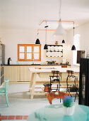 High country-style table in custom fitted kitchen