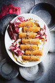 Filo cigars with pomegranate and cream