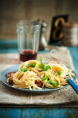 Lemon noodles with pancetta, garlic and olives