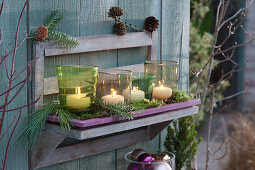 Wall frame with lanterns as an advent decoration