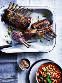 Roasted lamb rack with white beans and black garlic aioli
