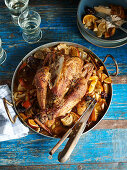 Spanish chicken on a bed of oranges, onions and dried fruit