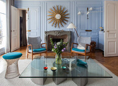 Vintage designer furniture in living room of Parisian period building