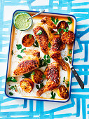 Grilled chicken bits with lemons and herb dip