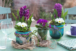 Table decoration with hyacinths and primroses