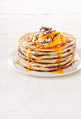 Gluten free crepes with nuts and oranges