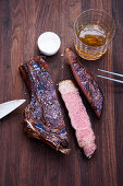 Grilled American rib-eye steak with a Bourbon glaze