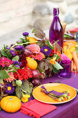 Table set for harvest festival in bright colours