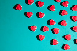 Heart sweets on turquoise background