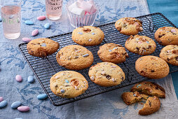 Chocolate cookies with marshmallows on a cooling rack