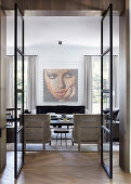 Glance into the elegant living room with artwork on the wall