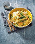 Spaghetti with asparagus, pea and ham carbonara