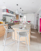 Modern bar stools at kitchen island counter