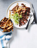 Sirloin steak with red wine sauce and kipfler chips