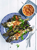 Barbecued whiting with a chilli-nut dressing