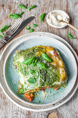 Vegan lasagne filled with spinach-basil pesto and vegetable sauce (tomatoes, bell pepper, lentil)