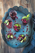 Berry and rosemary sangria with fresh mint