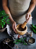 Spices being ground in a mortar