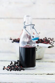 Elderberry juice in a flip-top bottle