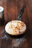 Airy, oven-baked almond cake served in a pan