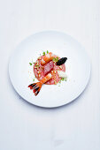 Yellow-tailed prawn and Sevruga caviar with walnuts and mirin rice wine dressing