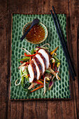 Marinated chicken breast with colourful stir-fried vegetables