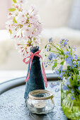 Branch Of Flowering Ornamental Cherry 'amanogawa' In Vase