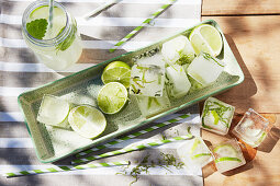 Ice cubes flavoured with lemon balm, mint and lime