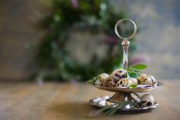 Quail eggs on cake stand