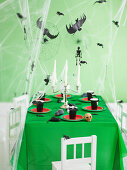 Eerily beautiful table setting for the Halloween party