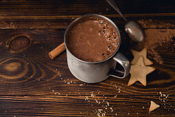 Hot chocolate in a mug with cookies