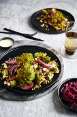 Roasted romanesco cauliflower salad with roasted red onions and ancient grains (roasted farro)
