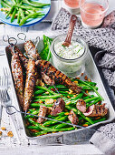 Mint lamb skewers with garlic beans