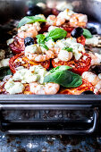 Oven-roasted tomatoes with prawns