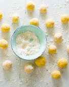 Uncooked potato dumplings with flour