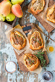 Mini pear pies with thyme and honey (seen from above)
