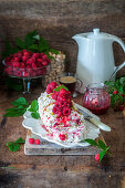 Raspberry and pistachio meringue roulade