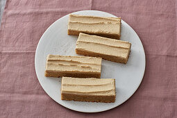 Slices of coffee cream oil-sponge cake