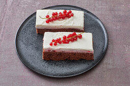 Slices of redcurrant cream oil-sponge cake