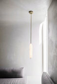 Low hanging ceiling lamp in the minimalist living room