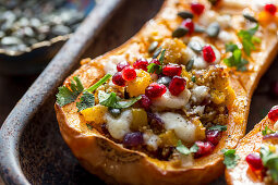 Middle eastern roasted butternut squash with quinoa and pomegranate