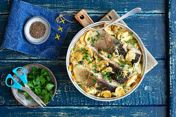 Gebackener Karpfen mit Sauerkraut und Champignons