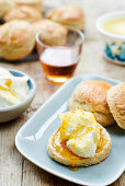 Scones with clotted cream and golden syrup